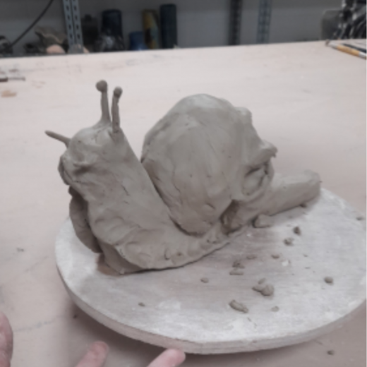 This piece is a current work in progress for my project titled 'Beautiful Decay', its is a sculpture of a snail with a skull as its shell and mushrooms growing from it.